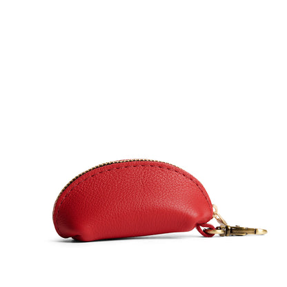 Poppy Red | Taco shaped leather pouch with zipper and swivel lobster clasp on white background