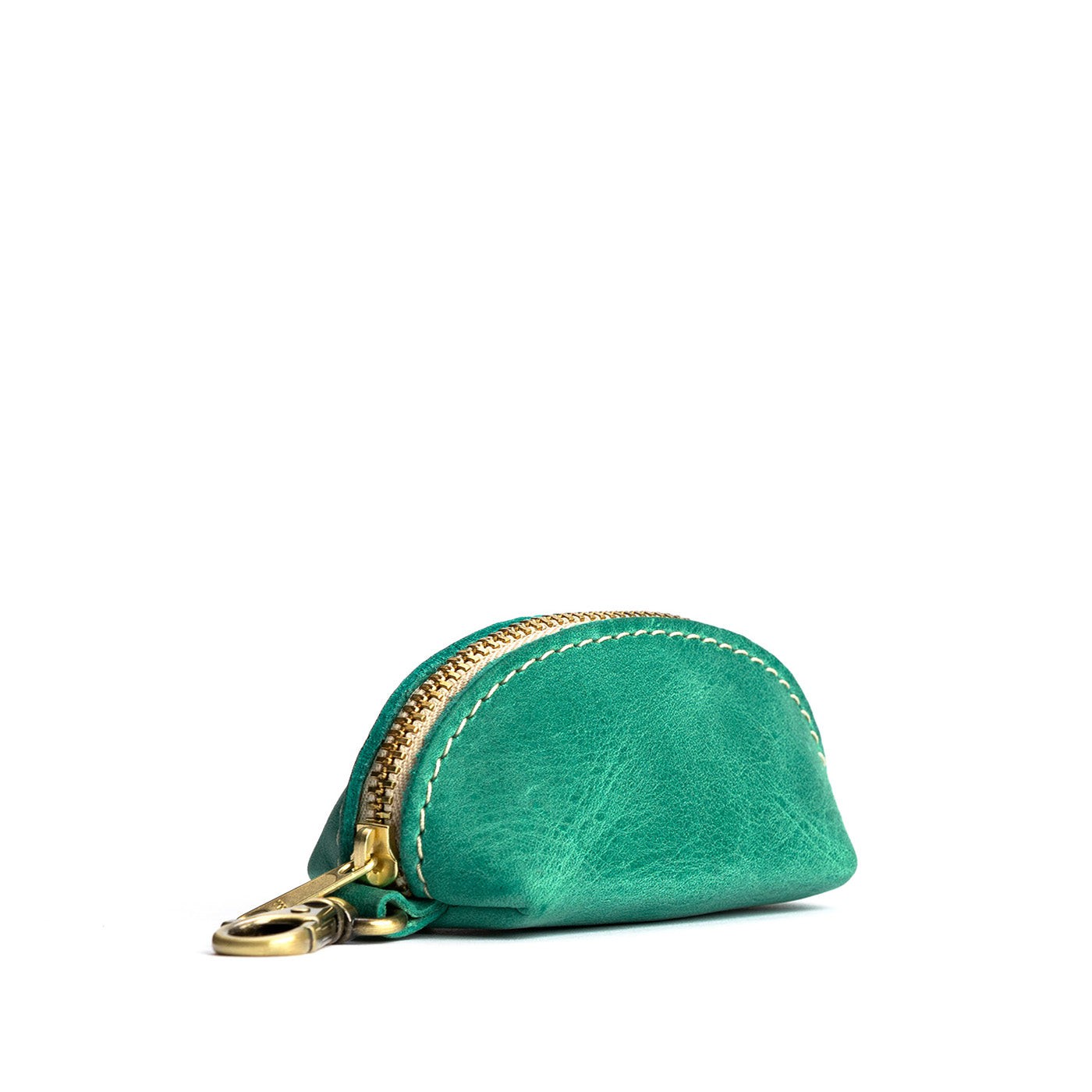 Reef | Taco shaped leather pouch with zipper and swivel lobster clasp on white background