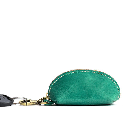 Reef | Taco shaped leather pouch with zipper and swivel lobster clasp on white background