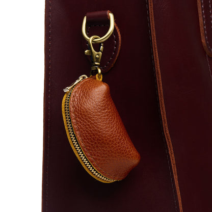 Sienna | Taco shaped leather pouch with zipper and swivel lobster clasp on bag