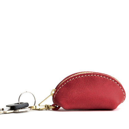Sugar | Taco shaped leather pouch with zipper and swivel lobster clasp on white background