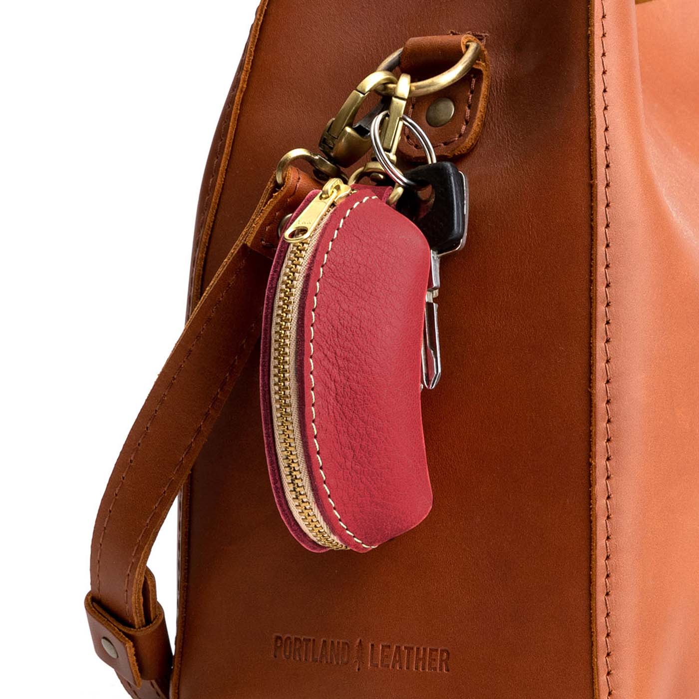 Sugar | Taco shaped leather pouch with zipper and swivel lobster clasp on bag