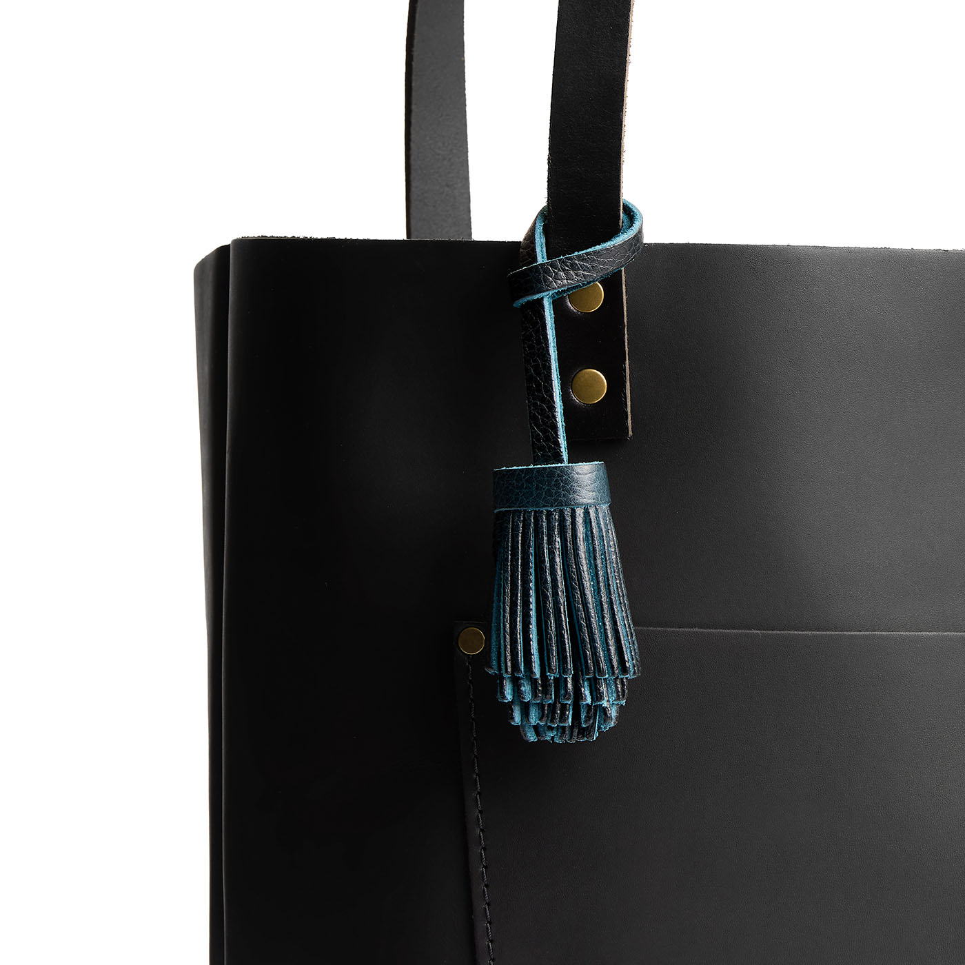 Boreal | Pom-pom style with tiered leather fringe