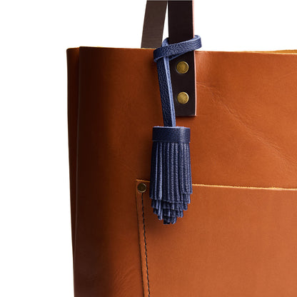 Cobalt | Pom-pom style with tiered leather fringe