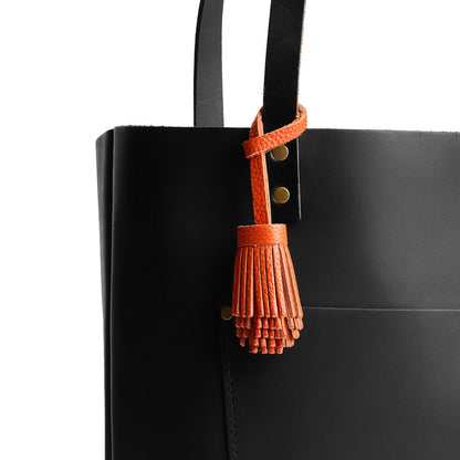 Koi | Pom-pom style with tiered leather fringe