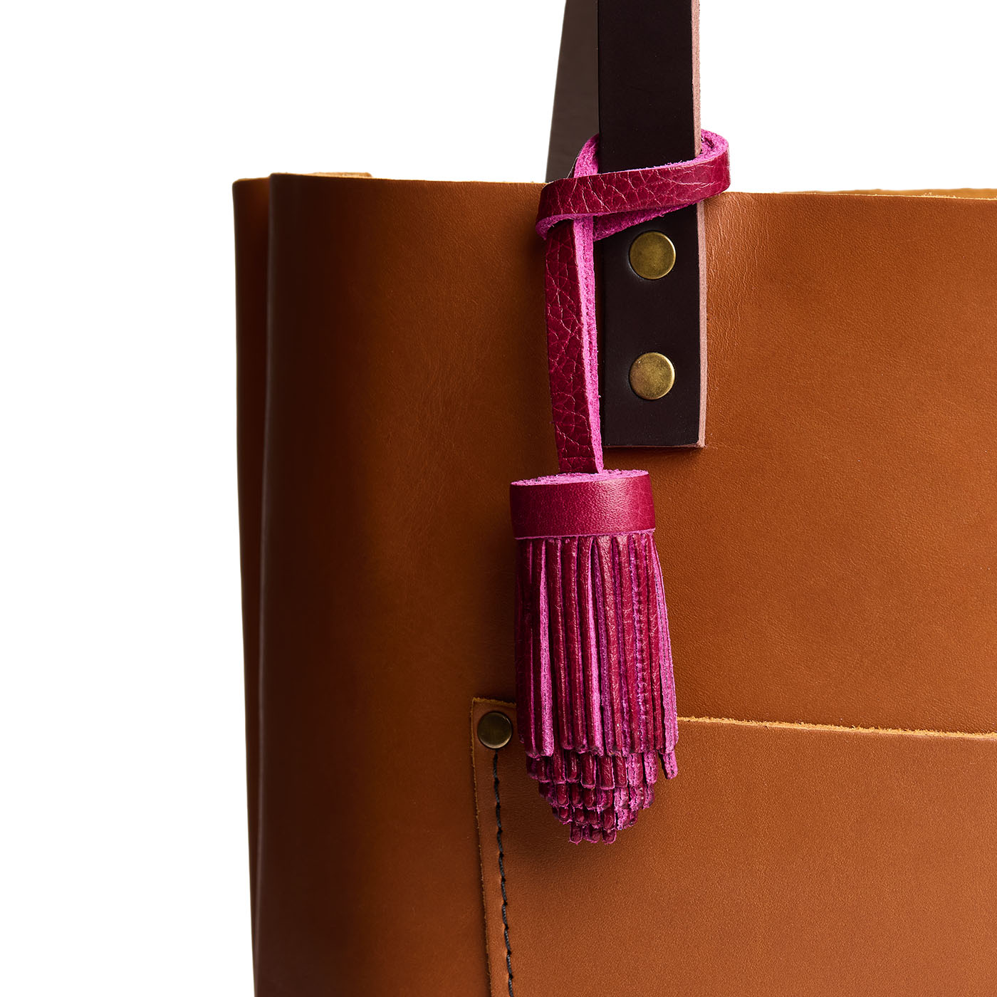 All Color: Orchid | Pom-pom style with tiered leather fringe