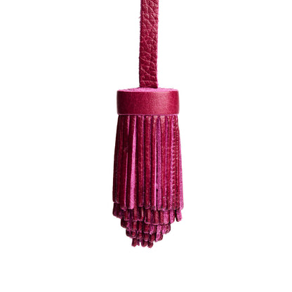 All Color: Orchid | Pom-pom style with tiered leather fringe