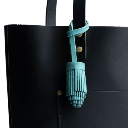All Color: Aqua | Pom-pom style with tiered leather fringe