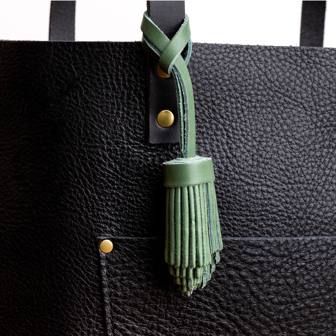 All Color: Eucalyptus | Pom-pom style with tiered leather fringe