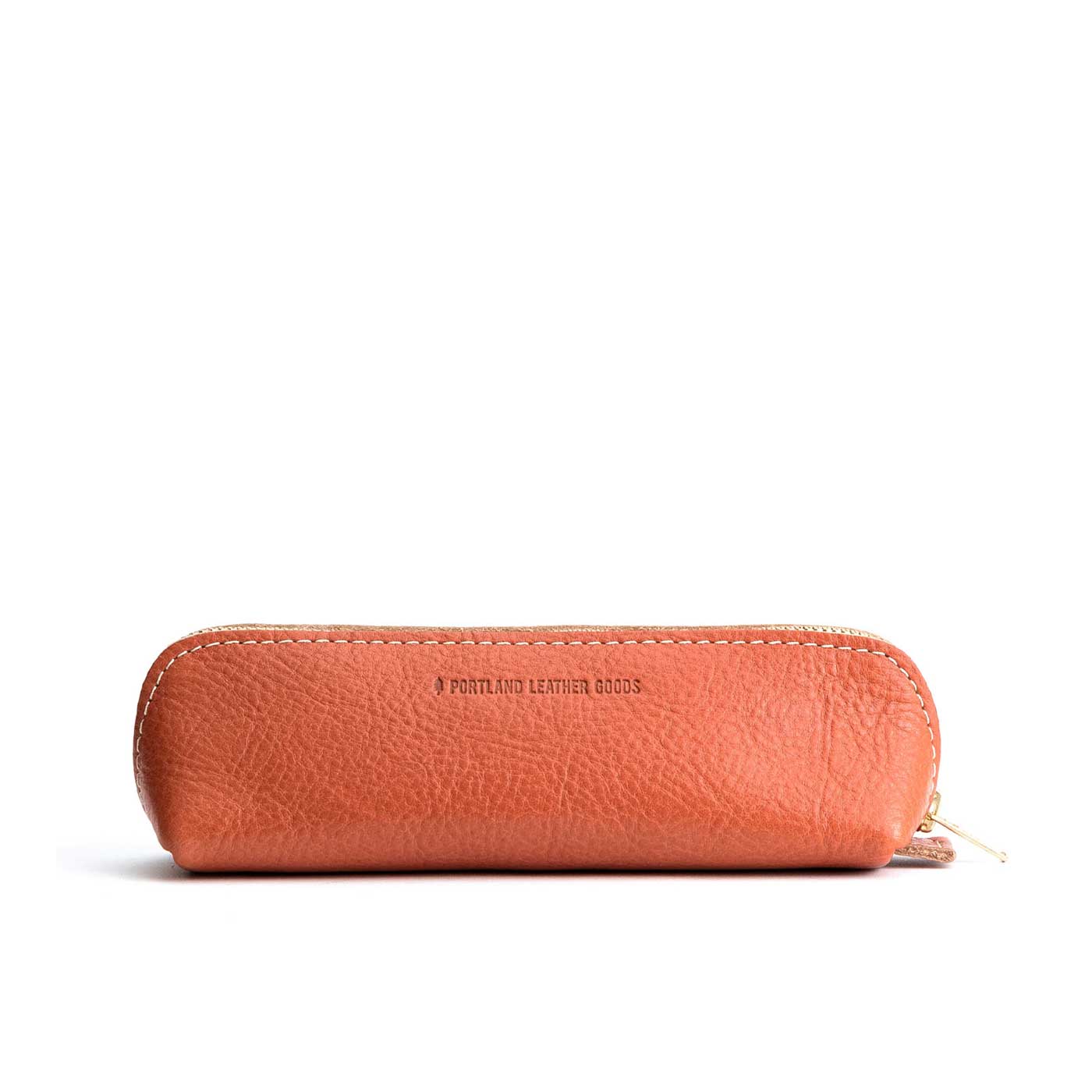 All Color: Satsuma | Leather pouch with curved seams and top zipper