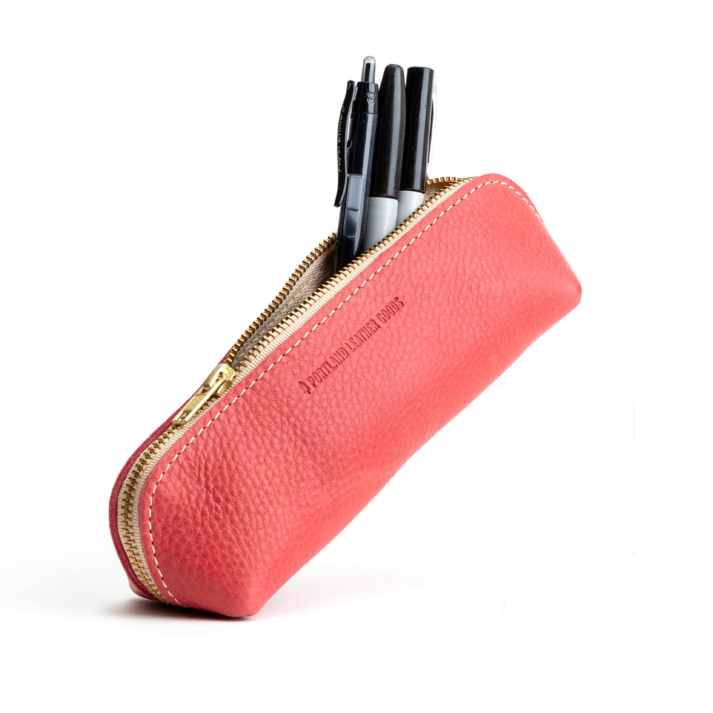 All Color: Sugar | Leather pouch with curved seams and top zipper