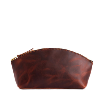 Lava*Total Eclipse | Spacious leather makeup bag with curved seams and top zipper