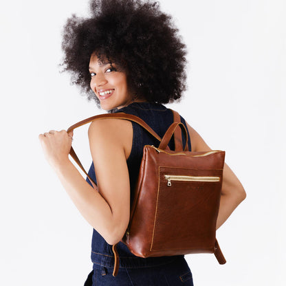 All Color: Nutmeg*Large | Model wearing square slim leather tote backpack