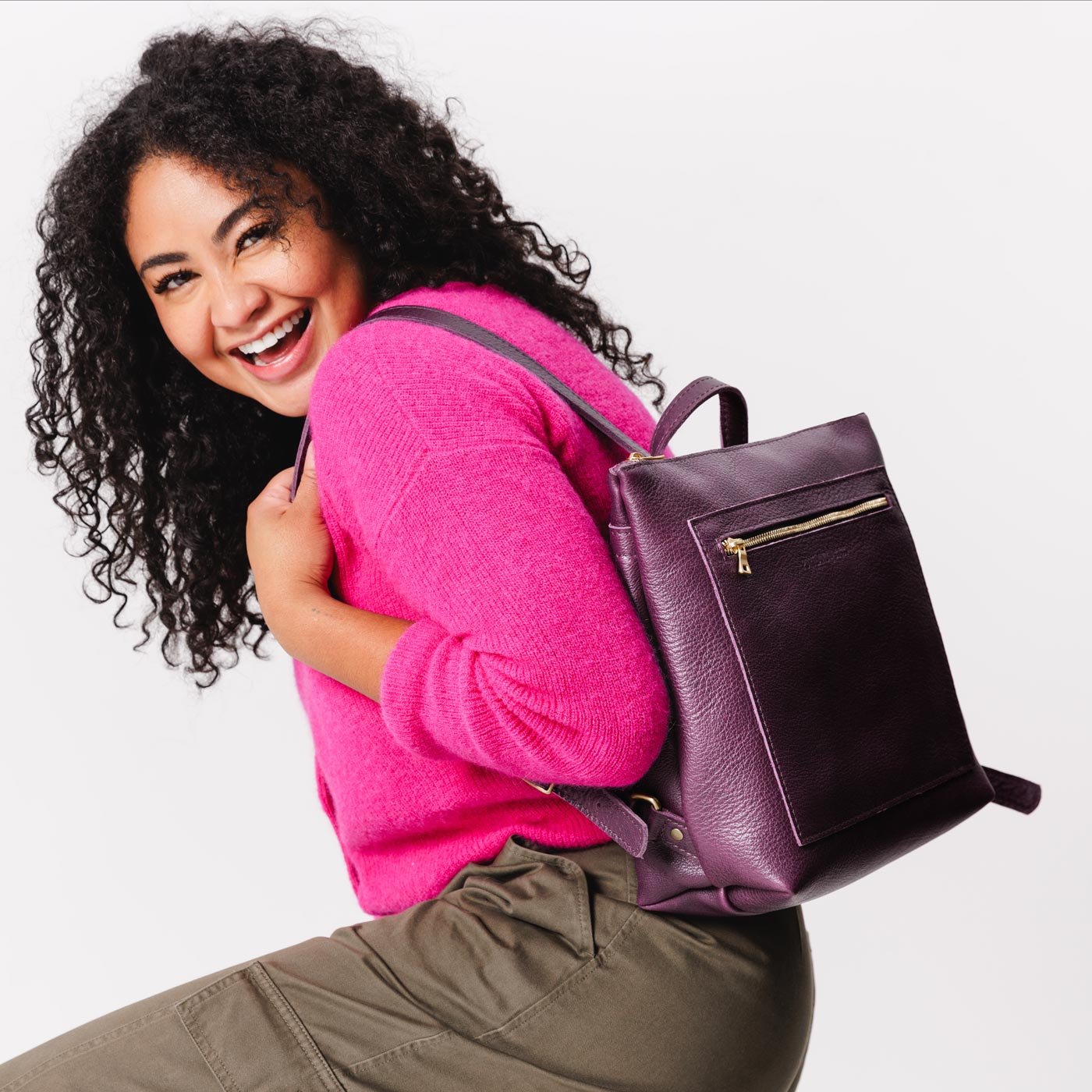All Color: Plum*Classic | Model wearing square slim leather tote backpack
