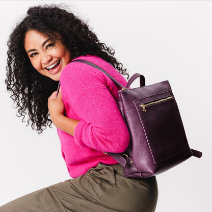 All Color: Plum*Classic | Model wearing square slim leather tote backpack