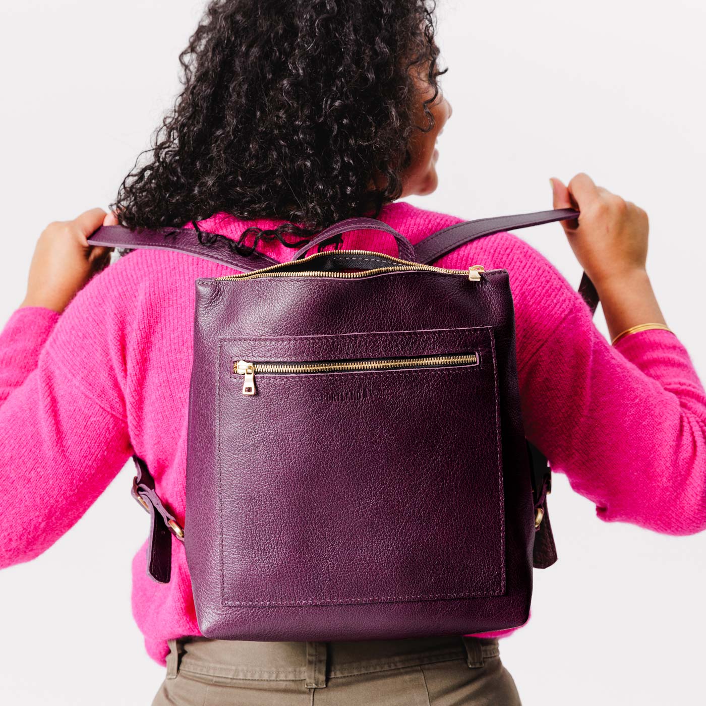 All Color: Plum*Classic | Model wearing square slim leather tote backpack
