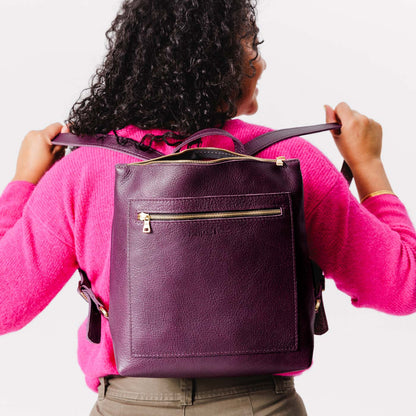 All Color: Plum*Classic | Model wearing square slim leather tote backpack