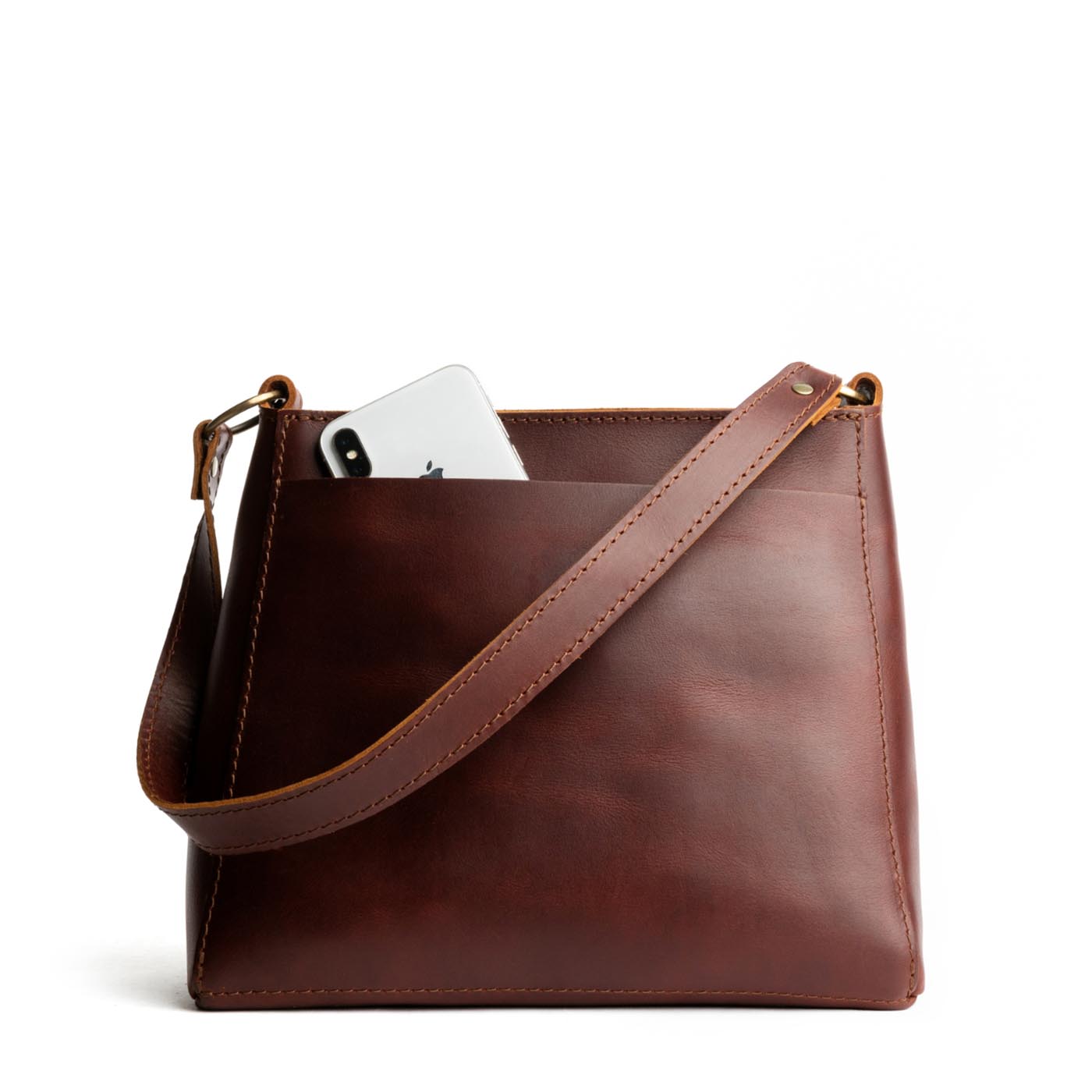Cognac*Small | Triangular shoulder bag with antiqued brass finished hardware