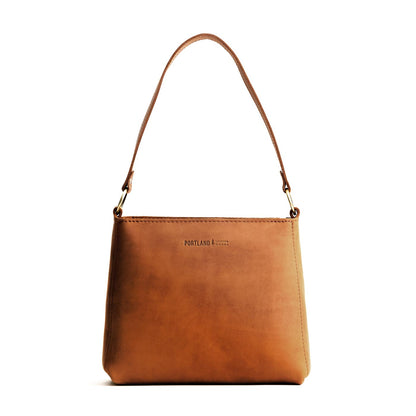 Dakota*Small | Triangular shoulder bag with antiqued brass finished hardware