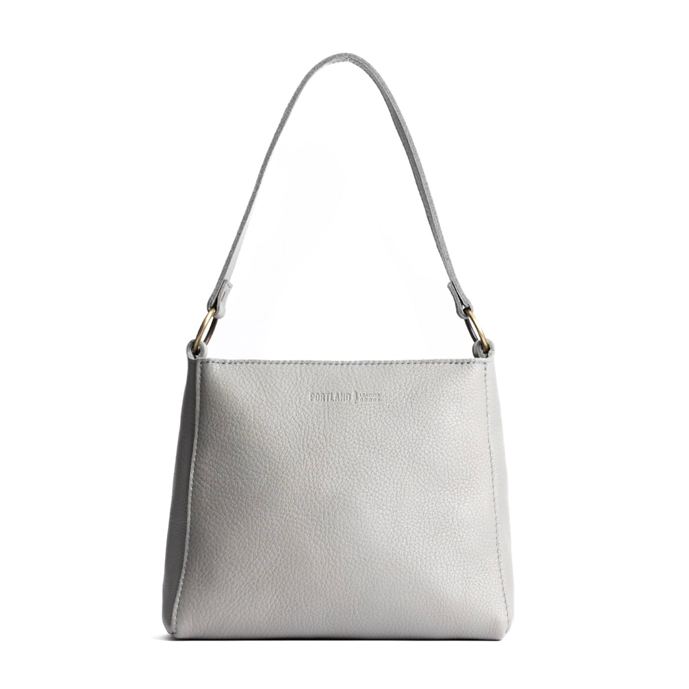 Nimbus*Small | Triangular shoulder bag with antiqued brass finished hardware