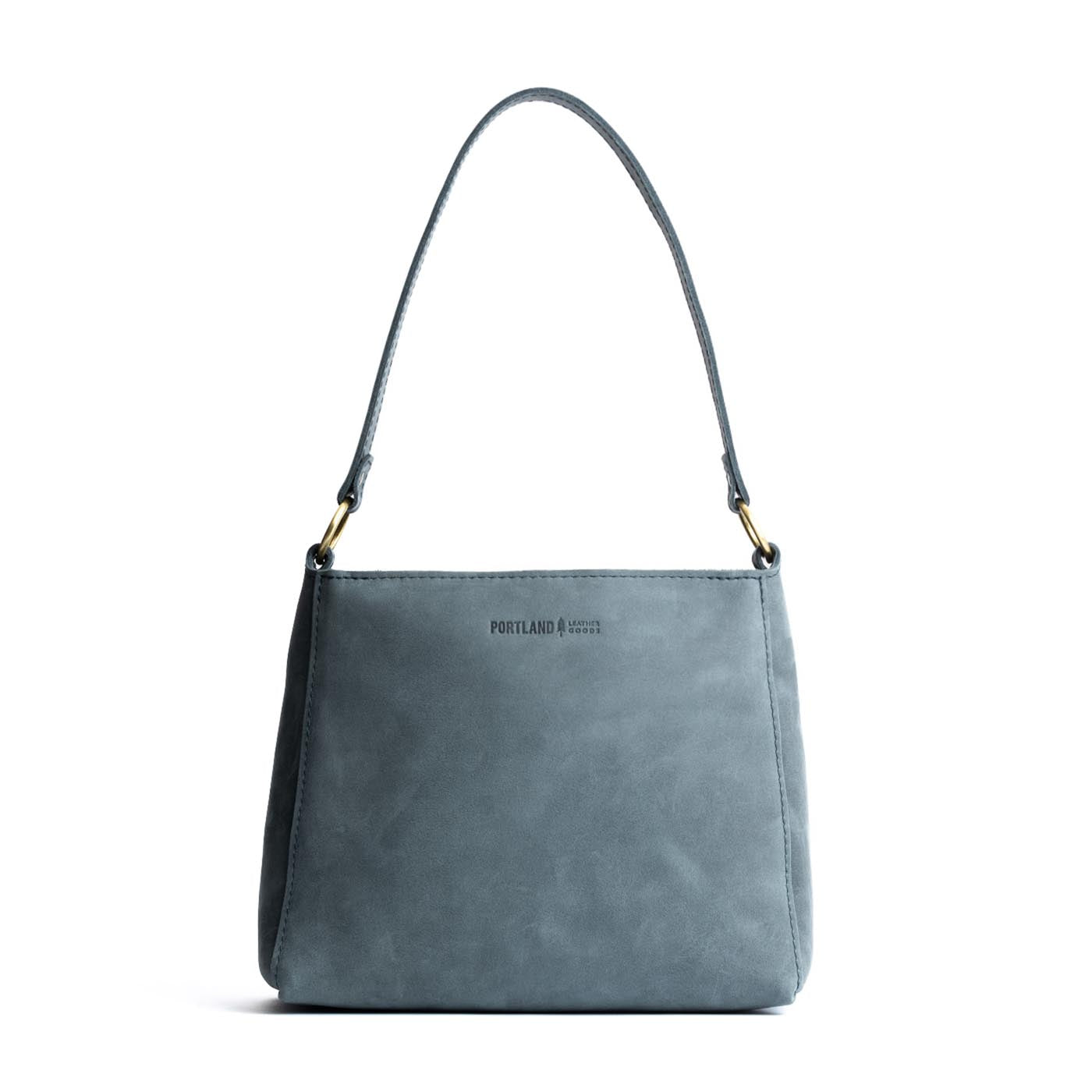 Storm*Small | Triangular shoulder bag with antiqued brass finished hardware