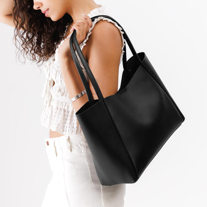 Black*Large | Model holding large rectangular tote bag