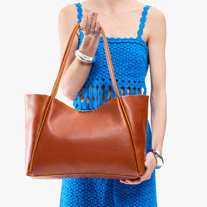 Sienna*Large | Model holding a large rectangular tote bag