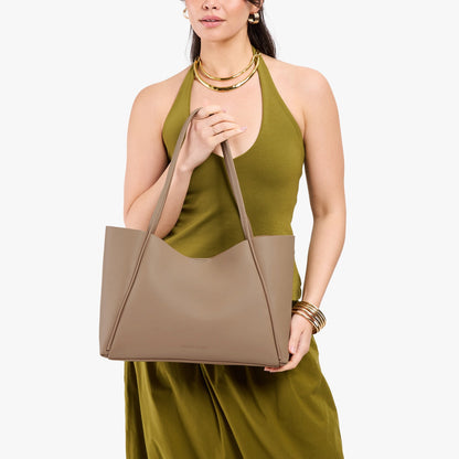 Stone*Large | Model holding a large rectangular tote bag