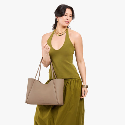 Stone*Large | Model holding a large rectangular tote bag