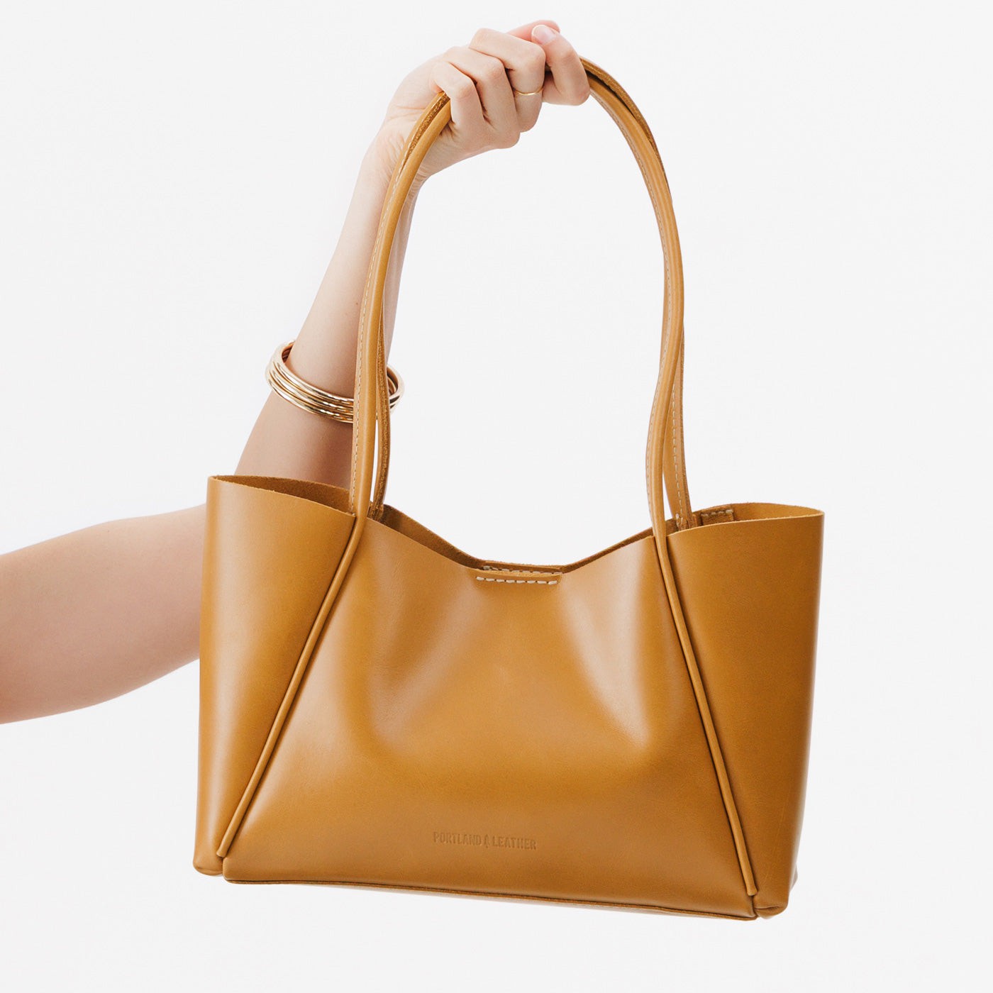 Mango*Medium | Model holding midsize rectangular tote bag