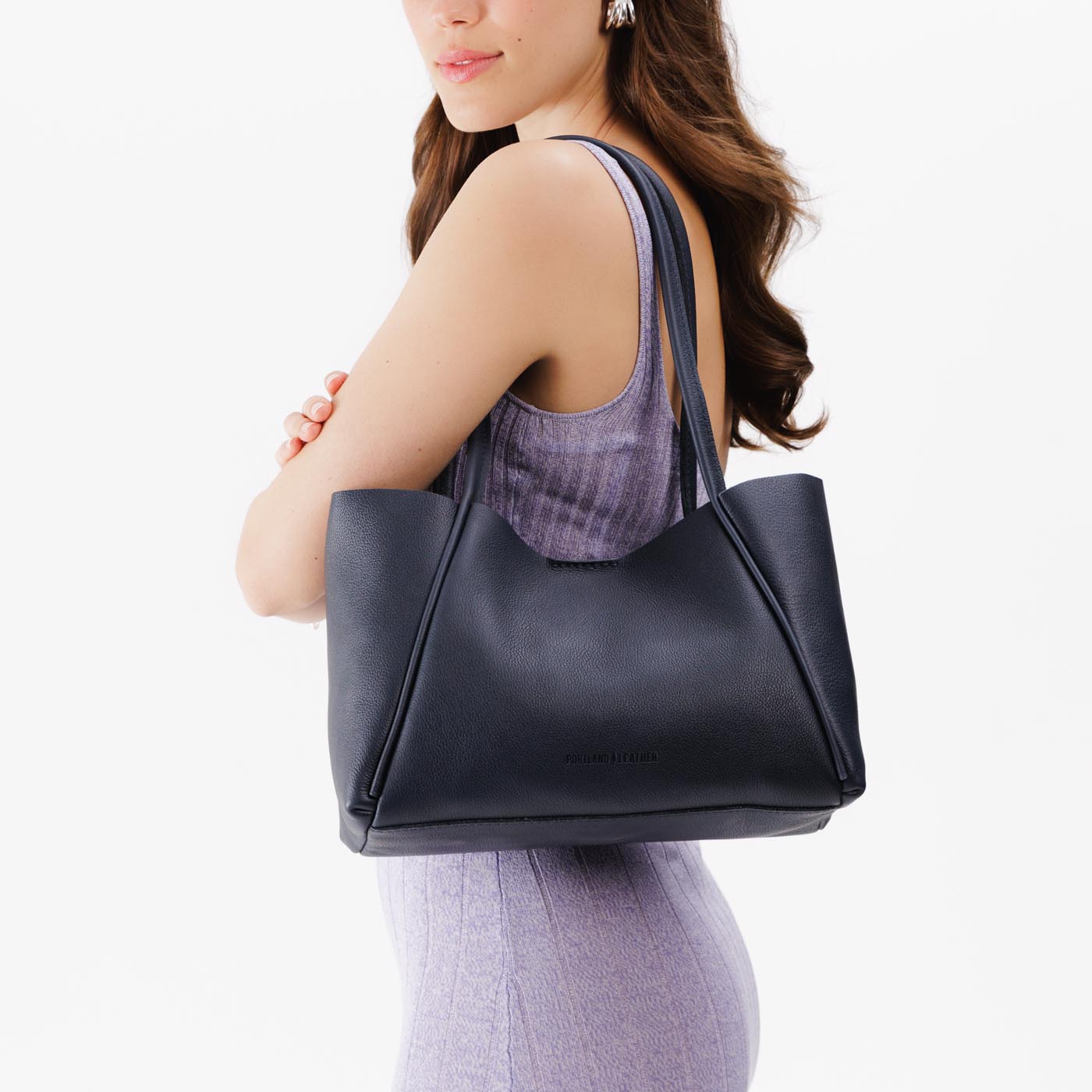 Night Owl*Medium | Model holding midsize rectangular tote bag