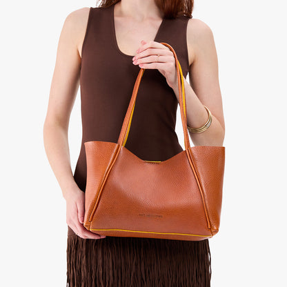 Sienna*Medium | Model holding midsize rectangular tote bag