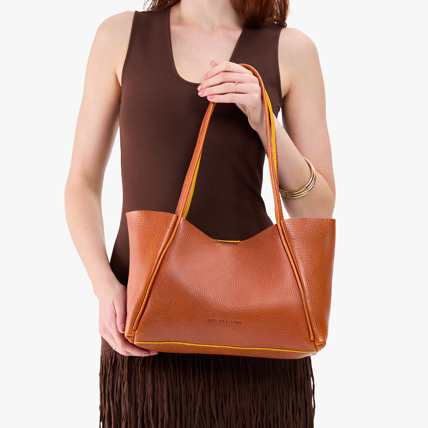 Sienna*Medium | Model holding midsize rectangular tote bag