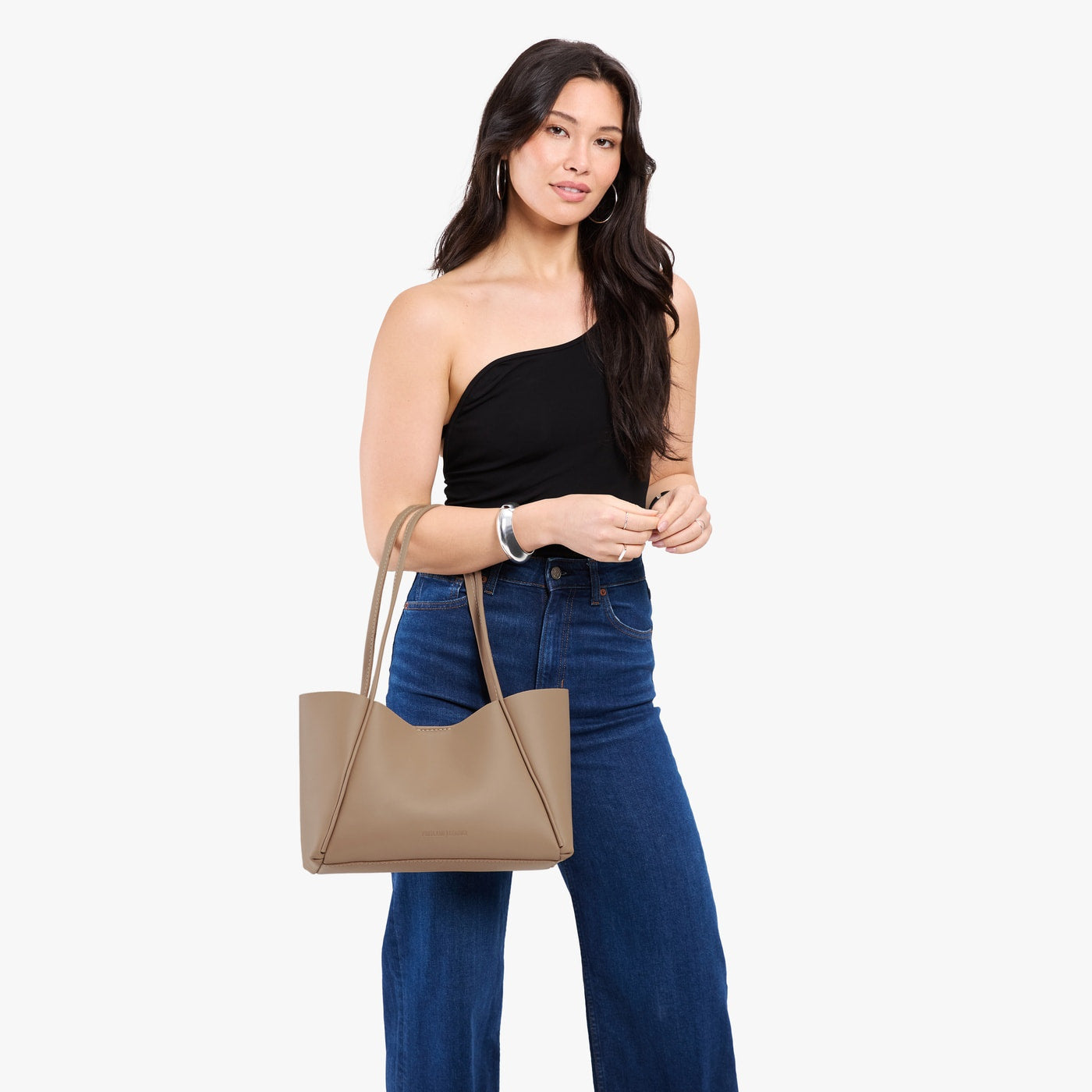 Stone*Medium | Model holding midsize rectangular tote bag
