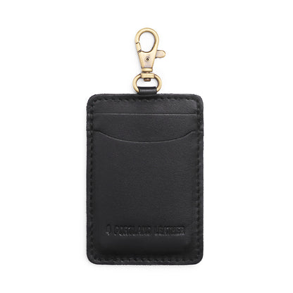 Black | A leather card holder with a swivel lobster clasp on a white background