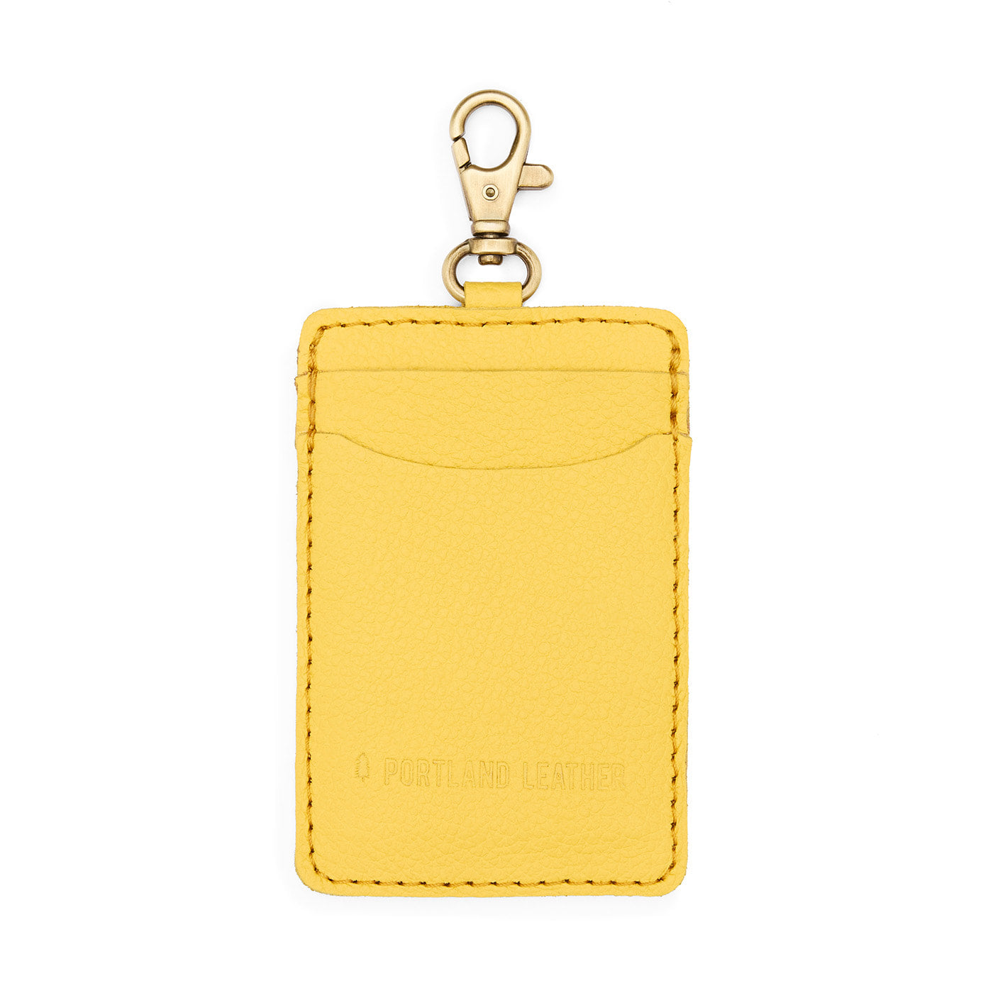 Canary | A leather card holder with a swivel lobster clasp on a white background