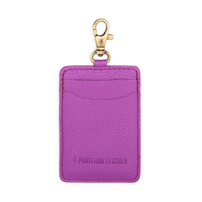 Cattleya | A leather card holder with a swivel lobster clasp on a white background