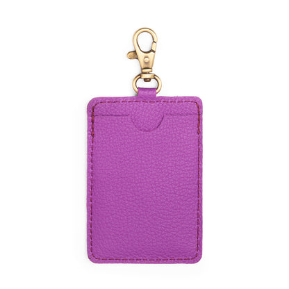 Cattleya | A leather card holder with a swivel lobster clasp on a white background