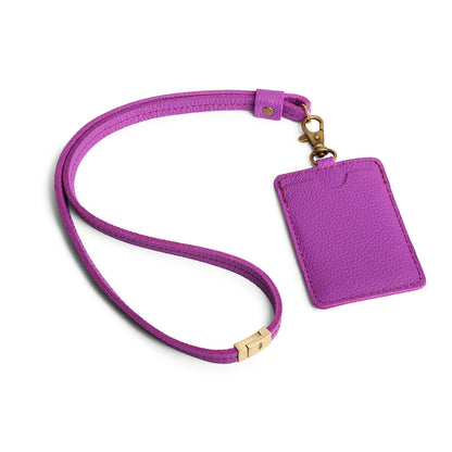 Cattleya | A leather lanyard attached to a matching card holder on a white background