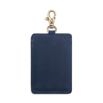 Deep Water | A leather card holder with a swivel lobster clasp on a white background