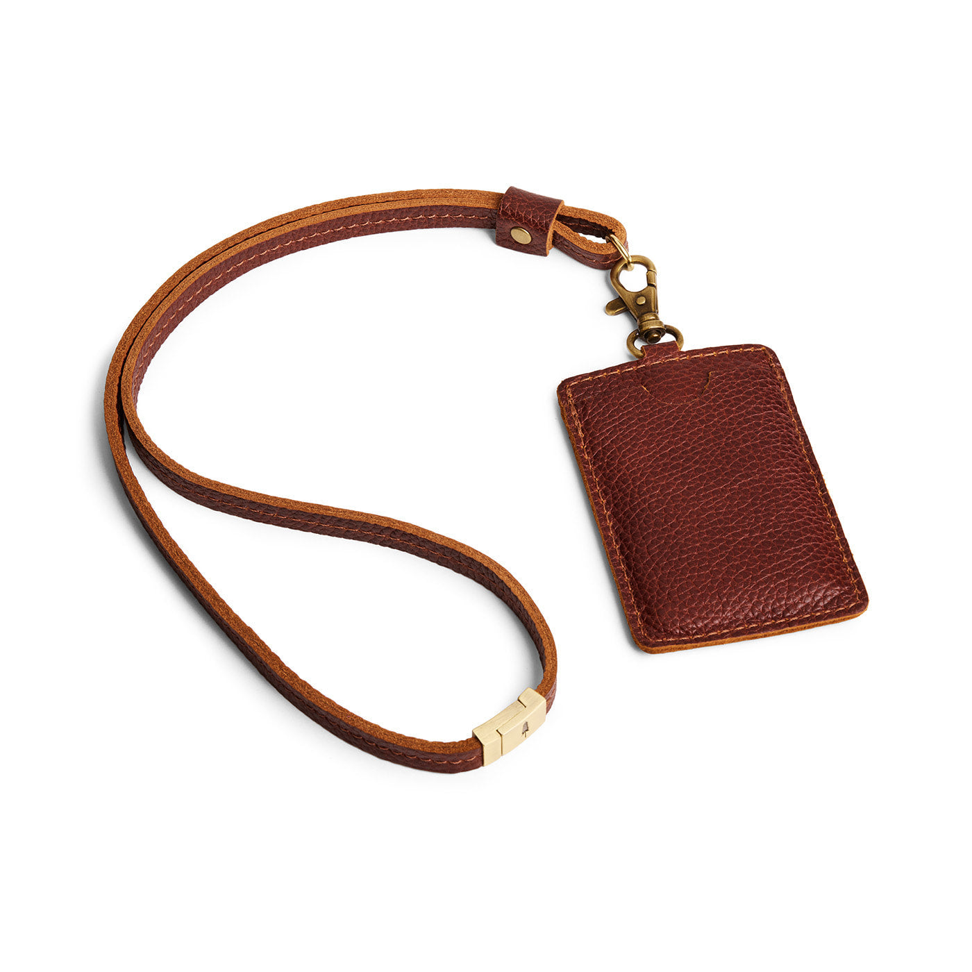 Nutmeg | A leather lanyard attached to a matching card holder on a white background