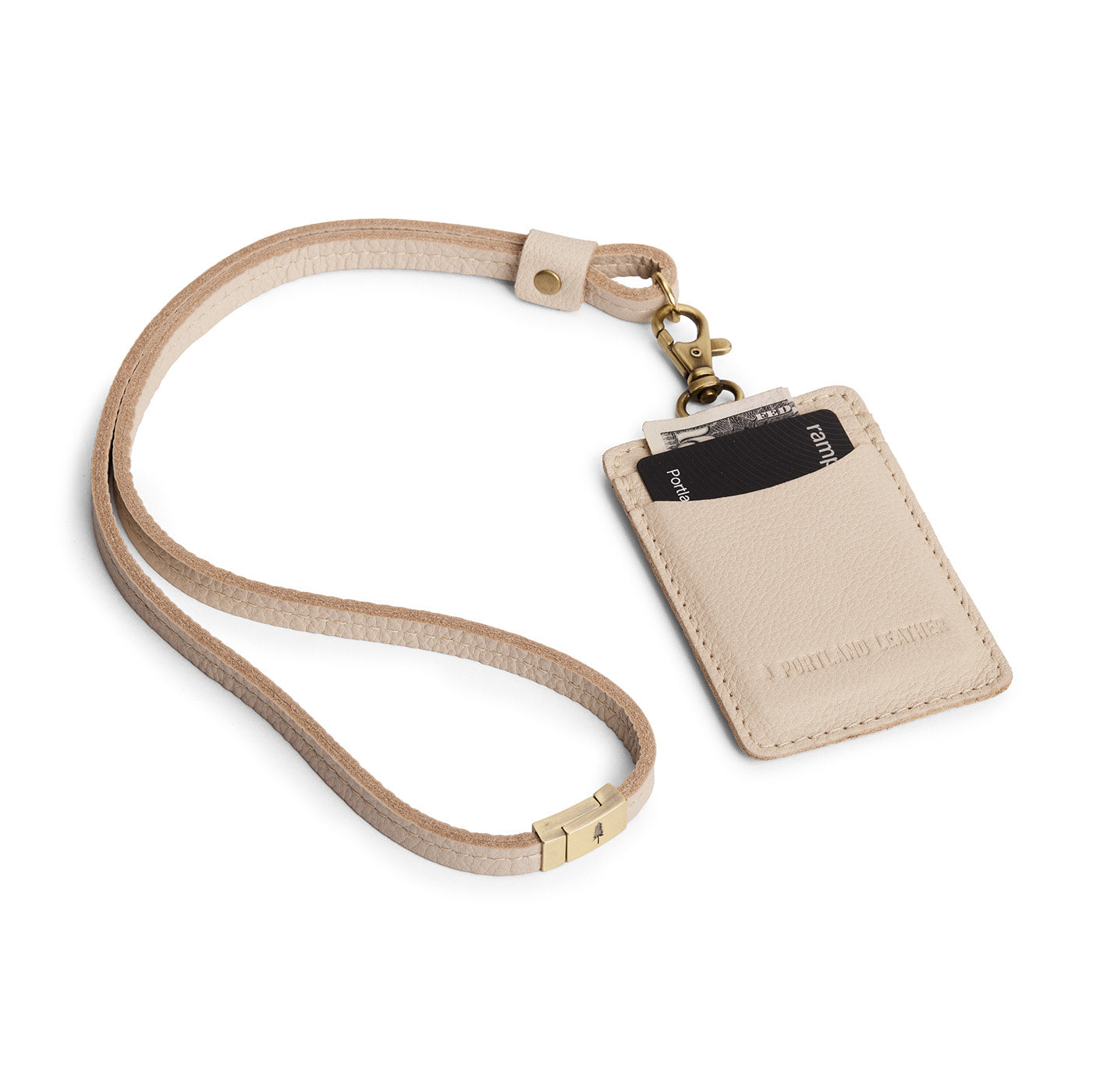 Pebbled Bone | A leather lanyard attached to a matching card holder on a white background