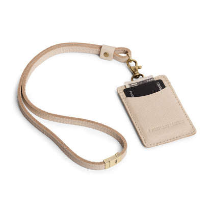 Pebbled Bone | A leather lanyard attached to a matching card holder on a white background