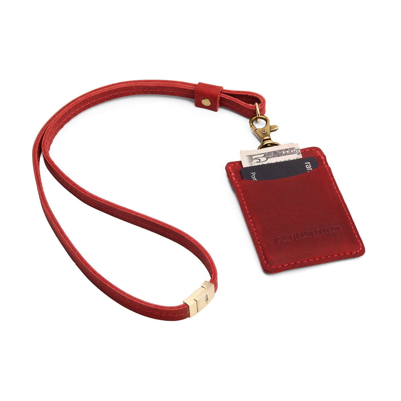 Phoenix | A leather lanyard attached to a matching card holder on a white background