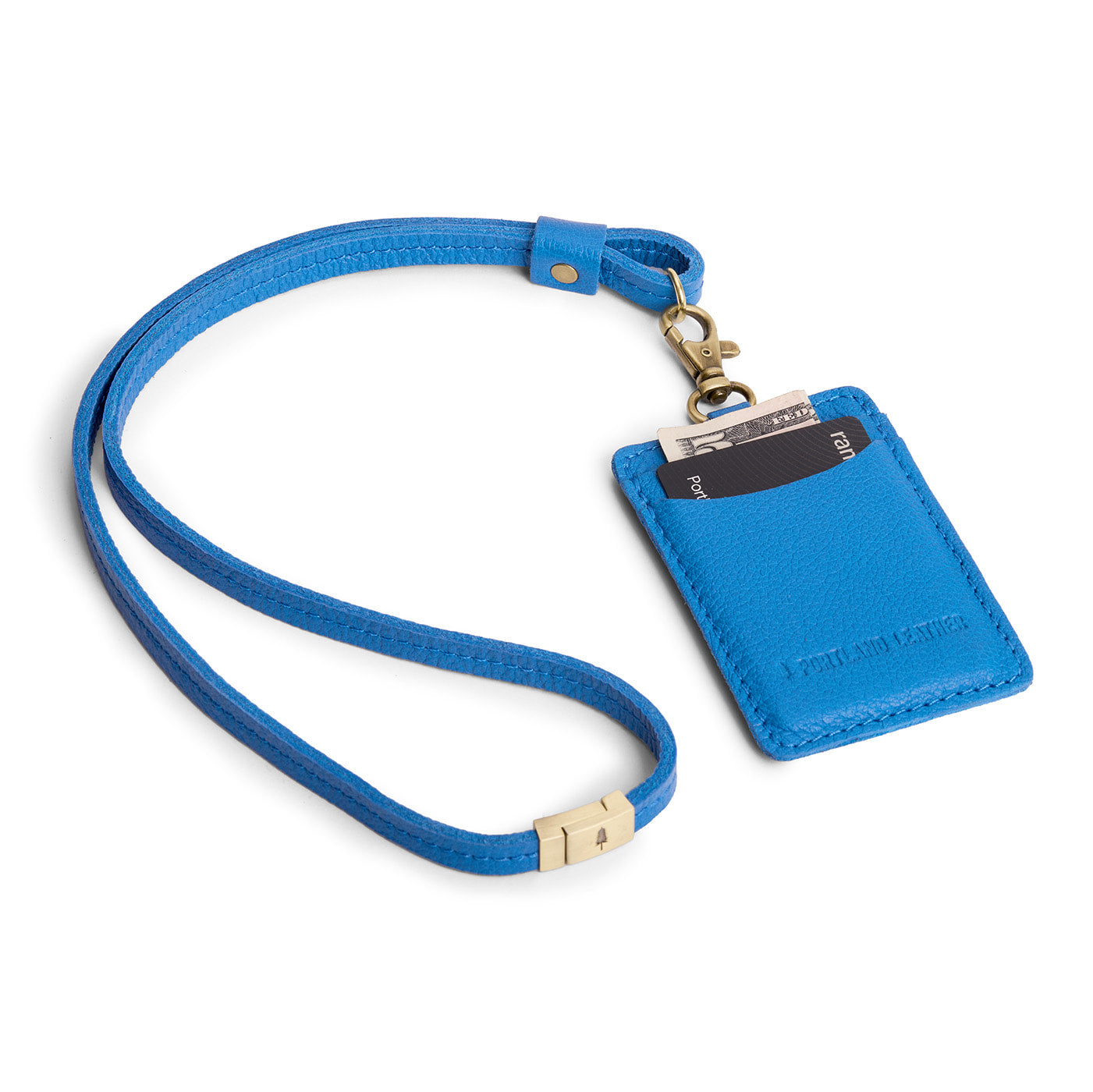 Skydive | A leather lanyard attached to a matching card holder on a white background